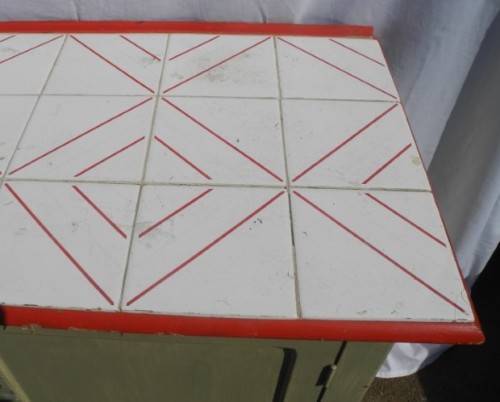 A wonderful vintage tile top multi purpose cabinet. Great restoration project!