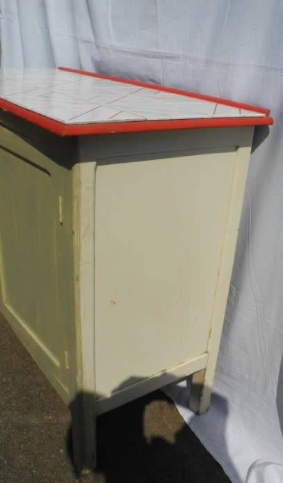 A wonderful vintage tile top multi purpose cabinet. Great restoration project!