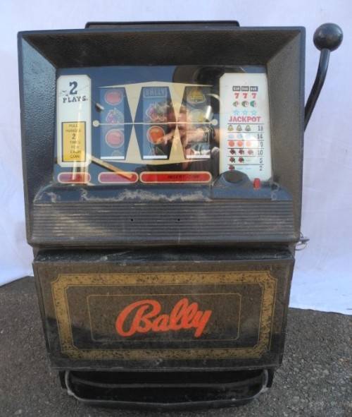 An awesome table top one arm bandit slot machine for restoration, stunning showpiece!