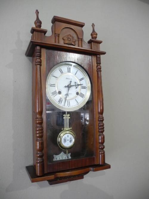 BARGAIN CLOCKS!!A vintage Blessing 31 day clock in a wood wall casing. Lifespace Sale