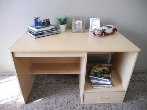 A modern melamine top desk with a pull out keyboard drawer. Lifespace Sale