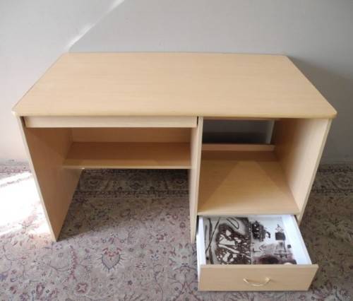 A modern melamine top desk with a pull out keyboard drawer. Lifespace Sale