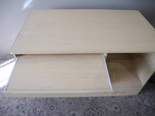 A modern melamine top desk with a pull out keyboard drawer. Lifespace Sale