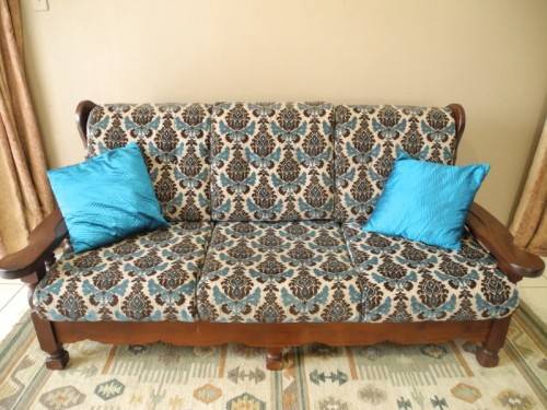 A colourful vintage Imbuia 3 seater couch - perfect in a lounge/patio/lapa.