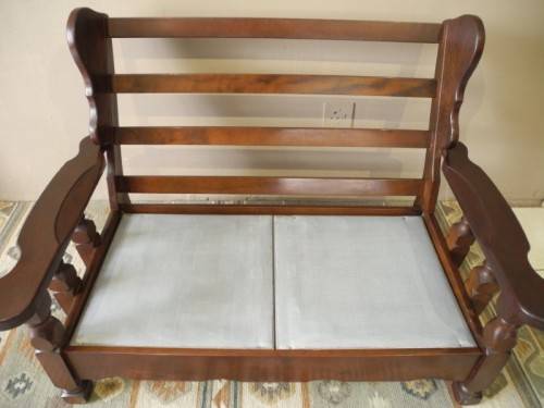 A colourful blue vintage Imbuia 2 seater couch - perfect in a lounge/patio/lapa.