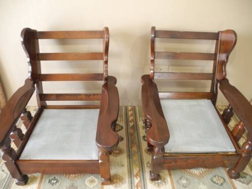 A pair of fabulous floral cushioned vintage Imbuia chairs - perfect in a lapa/patio.