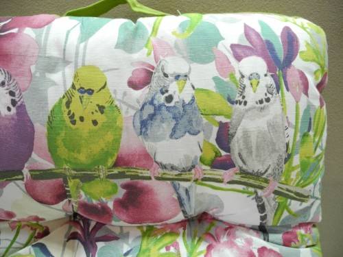 14 stylish upmarket brightly coloured patio chair cushions. Bid/cushion