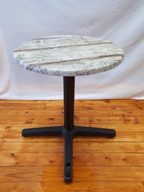 A lovely cafe style round table with newspaper print for indoor or outdoor use.-Xmas sale