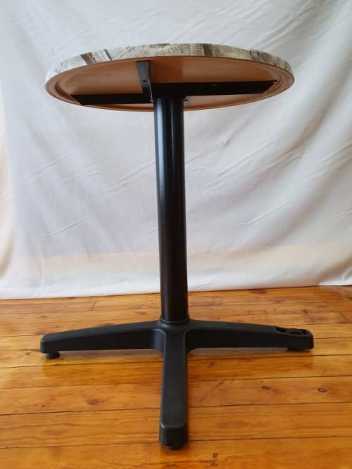 A lovely cafe style round table with newspaper print for indoor or outdoor use.-Xmas sale