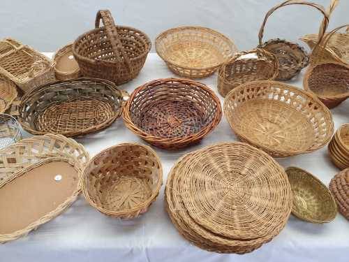 An assortment of table/ flower/ bread baskets, paper plate holders