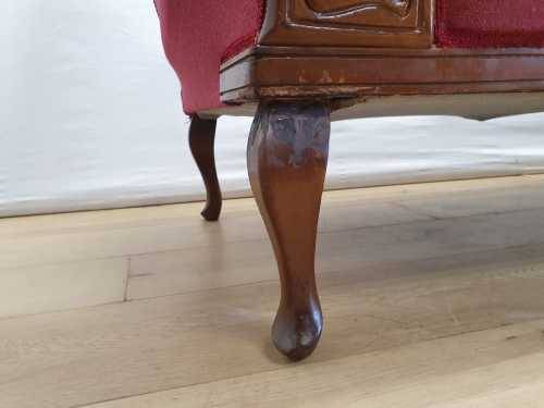 An Edwardian rail-back upholstered Chaise Lounge