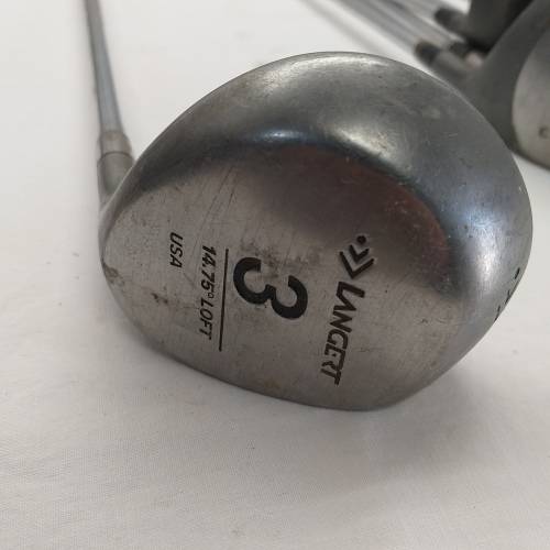 A collection of 11x assorted golf clubs, including irons, woods/ drivers and two putters