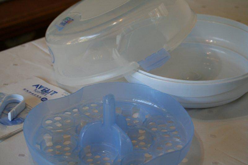 A STUNNING VIRTUALLY BRAND NEW AVENT "NATURALLY" EXPRESS 2 STERILISER! PLEASE VIEW THE PICS...