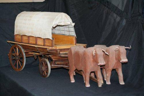 A HUGE RESTORED OX WAGON WITH OXEN!!! A STUNNING PIECE OF CRAFTMANSHIP... THIS IS THE ONE TO HAVE!