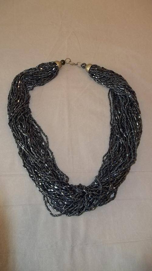 A VERY STUNNING MULTI-STRAND METALLIC BLACK GLASS BEADED LADIES NECKLACE WITH CLASP
