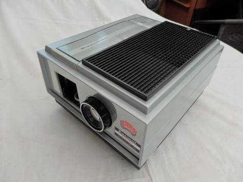 AN AMAZING WEST GERMAN MADE BRAUN PAXIMAT 3000 AUTO FOCUS SLIDE PROJECTOR IN IT'S ORIGINAL BOX