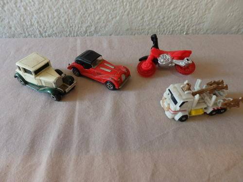 AN AWESOME ASSORTMENT OF CARS INCLUDING MATCHBOX, MAJORETTE AND HOTWHEELS.