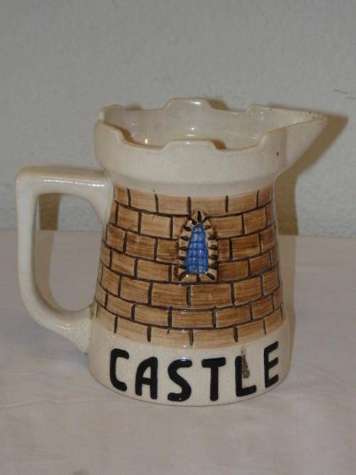 A BEAUTIFUL VINTAGE CASTLE LAGER BEER JUG BY DROSTDY WARE GRAHAMSTOWN POTTERS LTD.