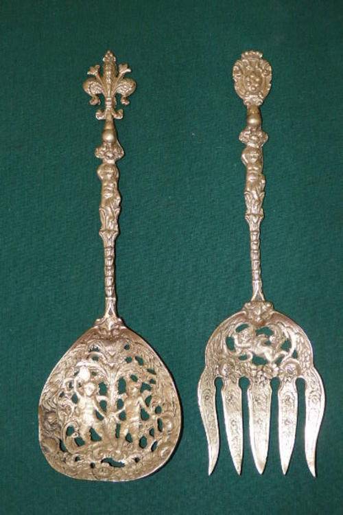 A MAGNIFICENT PAIR OF ITALIAN MADE VINTAGE "BAROQUE STYLE" CHERUB FOOD SERVERS BY UGO BELLINI