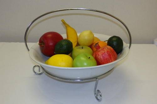 AN AWESOME ROUND WHITE CERAMIC SERVING BOWL IN A CHROMED METAL "CARRY" STAND