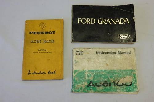 THREE AWESOME CAR RELATED HANDBOOKS INCLUDING THE AUDI 100, PEUGEOT 404 & FORD GRANADA