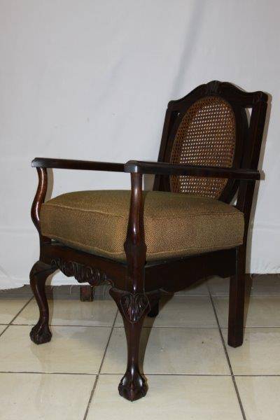 AN EXQUISITE ANTIQUE STINKWOOD RATTAN BACK BALL & CLAW CARVED CHAIR IN EXCELLENT ORIGINAL CONDITION!