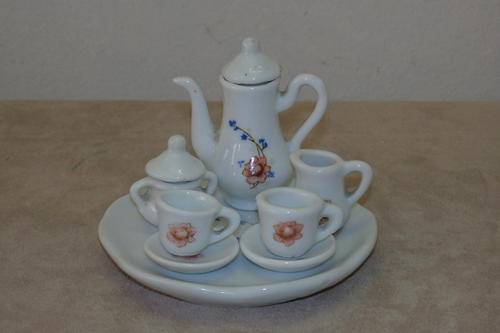 A FANTASTIC VINTAGE 10 PIECE HAND MADE WHITE PORCELAIN "DOLLS HOUSE" TEA SET WITH PINK FLOWERS