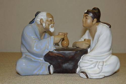 AN ABSOLUTELY STUNNING SIGNED CHINESE TERRACOTTA FIGURINE OF A MASTER AND HIS PUPIL DRINKING TEA