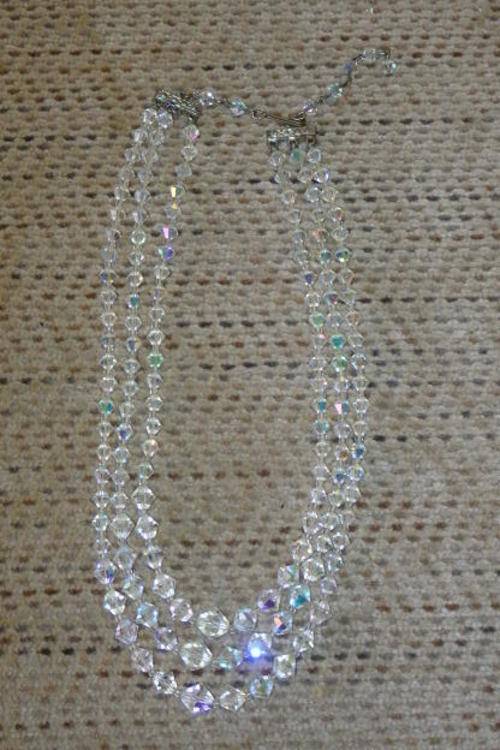 A MAGNIFICENT AND VERY ELEGANT THREE STRAND CRYSTAL NECKLACE WITH AN EXTENDER