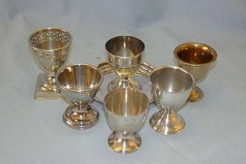 A WONDERFUL COLLECTION OF SIX ASSORTED VINTAGE SILVER PLATED EGG CUPS
