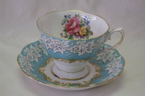 AN SUPERB VINTAGE ROYAL ALBERT OF ENGLAND "ENCHANTMENT" CUP AND SAUCER SET IN THE MALVERN SHAPE
