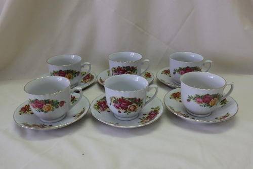 A BEAUTIFUL COLLECTION OF SIX REGENT CHINA "ENGLISH ROSE" TEA CUP AND SAUCER DUO'S