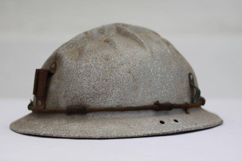 AN INCREDIBLE ANTIQUE (c1940's) BROAD BRIMMED MINERS HARD HAT WITH A LIGHT ATTACHMENT ON THE FRONT