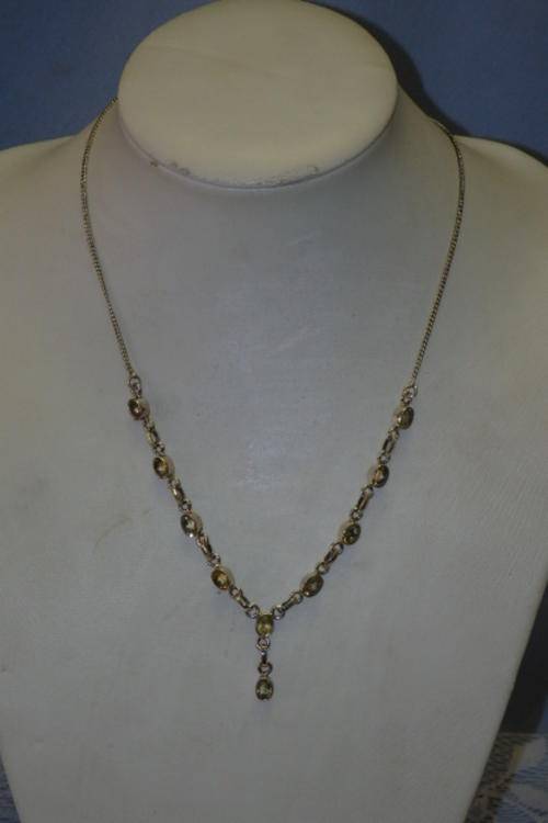 A BEAUTIFUL STERLING SILVER LADIES NECKLACE WITH A SERIES OF 10 INCREDIBLE OVAL CITRINE STONES