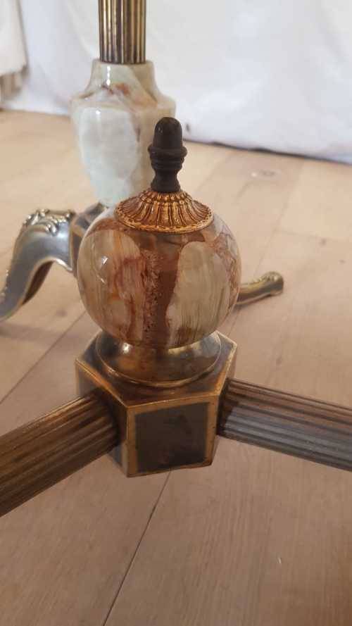 An exquisite and beautifully made round Italian marble and ornate solid brass coffee table