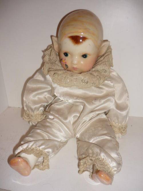 DOLL-STUFFED WITH PORCELAIN HEAD,HANDS AND FEET-37CM TALL-HEAVY
