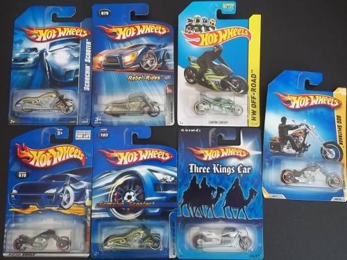 7 X HOTWHEELS  MOTORCYCLES !! DIFFERENT MODELS ! MINT MOTORBIKES IN SEALED UNOPENED PACKAGING !