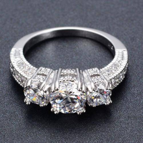 **SOLID STERLING SILVER**Stunning 1.25 Carat Cr. Diamond Brilliant Round Trilogy Rhodium Ring