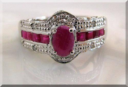 SOLID GOLD!!!.. ELEGANT NATURAL RUBIES AND DIAMONDS SET IN 10K SOLID GOLD