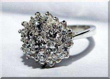 **SAVE R75 SHIPPING!**STUNNING SIMULATED DIAMONDS SET IN SOLID.925 STERLING SILVER size 5