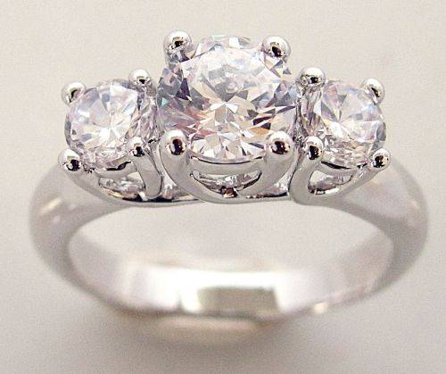 Trilogy of CZ Diamonds set in 18K GP White Gold Ring sz6
