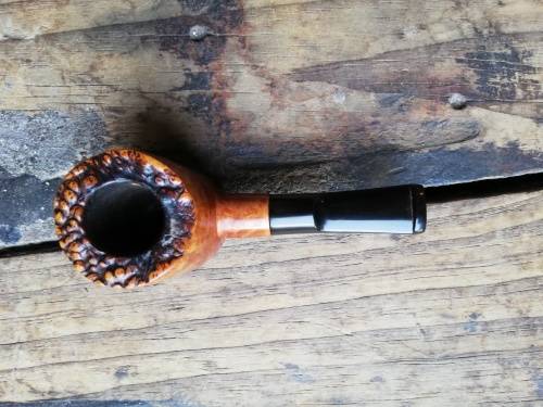 Mario Grandi smoking pipe