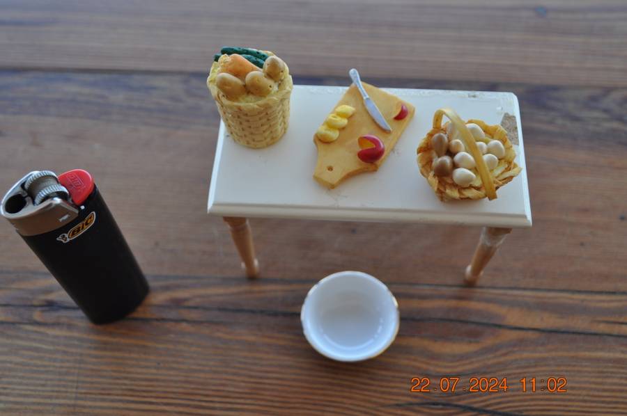 Dolls house kitchen table with extras