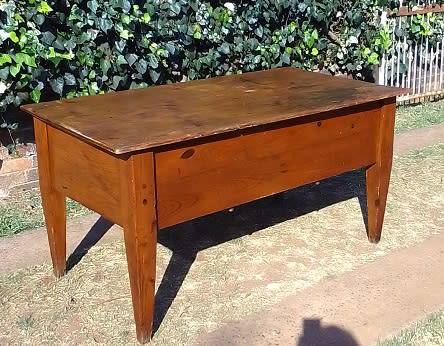Lovely 1800`s, rustic Oregon desk / table with four drawers, cup handles and thick tapered legs.