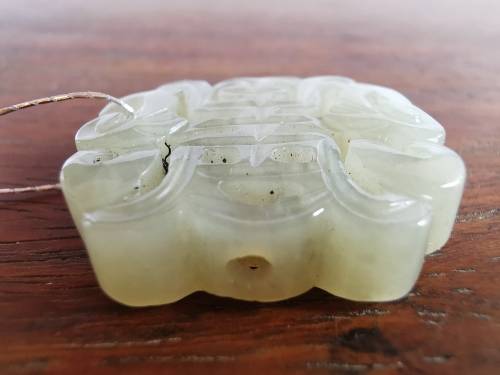 The Hetian Jade of the Qing Dynasty in China is a jade pendant with both good luck and longevity.