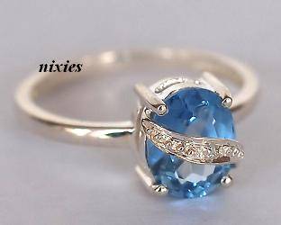 LOVELY 925 STERLING SILVER BLUE TOPAZ CZ RING - SIZE 6(M)