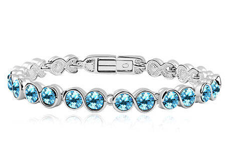 LOVELY SKY BLUE TOPAZ SWAROVSKI TENNIS BRACELET