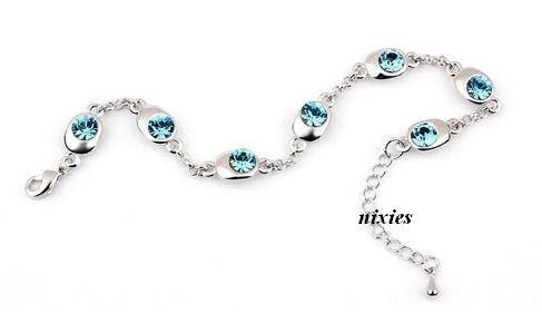 DAZZLING BLUE TOPAZ SWAROVSKI TENNIS BRACELET