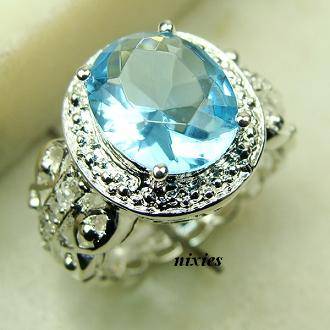 LOVELY BLUE TOPAZ STERLING SILVER RING - SIZE 7(O)