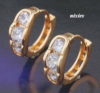 FEMININE YELLOW GOLD HUGGIES WITH DIAMOND SIMULANTS